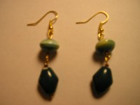 Swirled stone atop a dark green daimond shaped stone